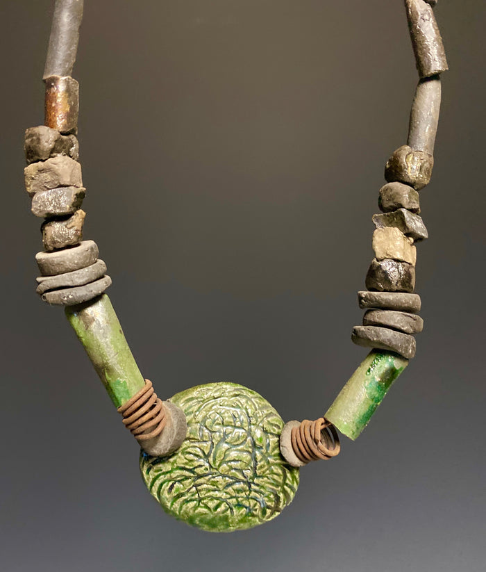 Nice!! Don't Let this one get away! Centerpiece large Raku bead (2) wire 1” coil 12' hang 25+ raku beads