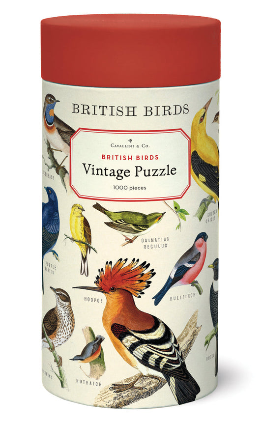 A cylindrical puzzle box labeled "British Birds Puzzle" from the Cavallini Papers & Co archives, with illustrations of various bird species on it.
