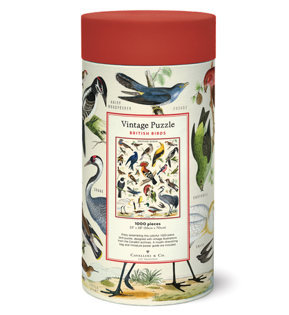 A cylindrical puzzle box labeled "British Birds Puzzle" from the Cavallini Papers & Co archives, with illustrations of various bird species on it.