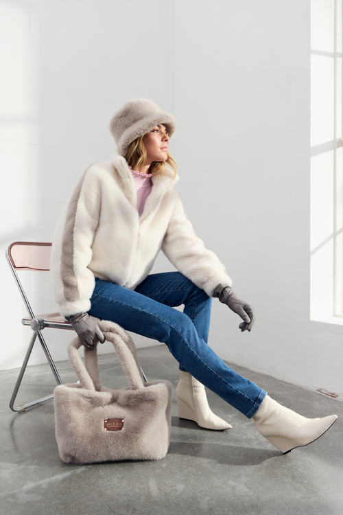 Shop the MICHA Cream Faux Fur Zip Jacket at Dotique. A soft cream faux fur jacket with a high neck and zip fastening, perfect for everyday winter layering.