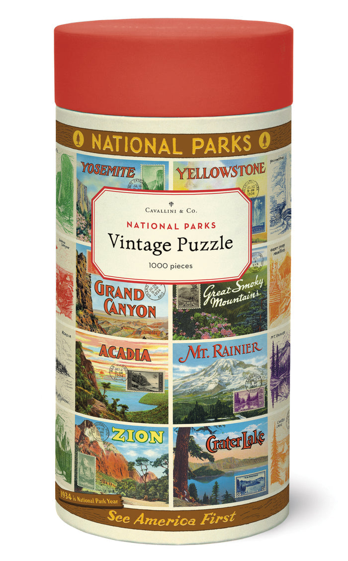 A 1000-piece National Parks 2 Puzzle featuring vintage imagery of U.S. national parks, packaged in a cylindrical container by Cavallini Papers & Co.