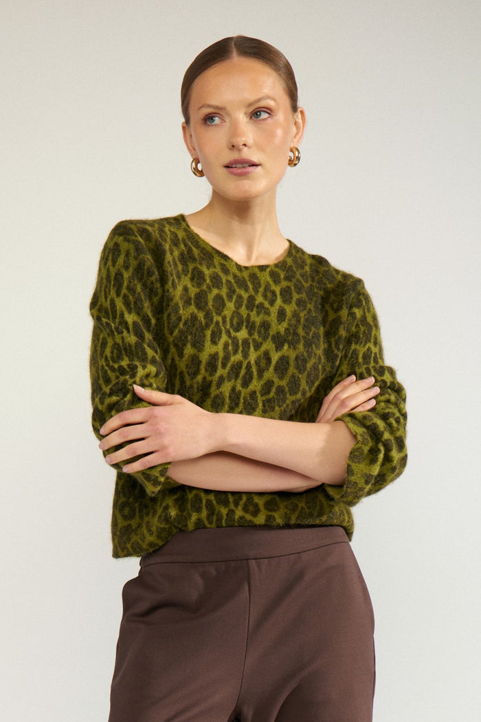 Model wearing Numph 707215 Nuriette Leo Jumper Calla Green by Numph, shop the brand at Dotique for stylish knitwear