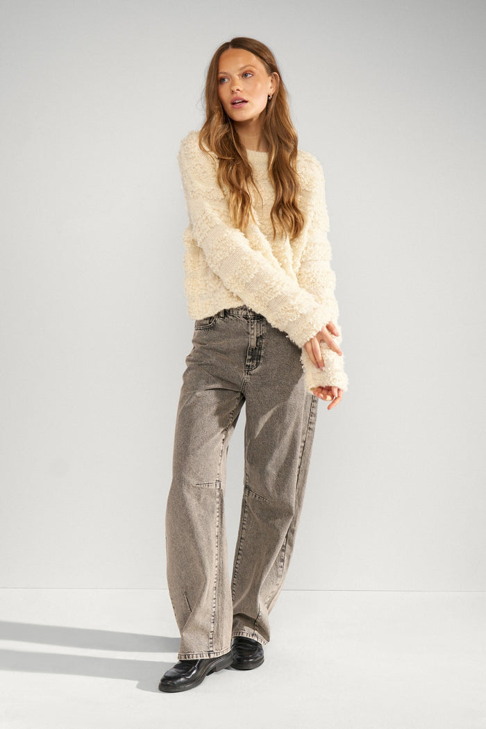 Model wearing Numph 707238 Nusheeba Jumper Pristine by Numph, shop the brand at Dotique for cozy knitwear options