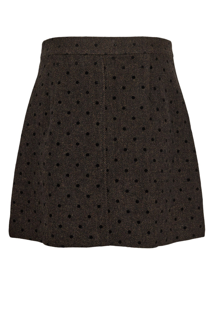 Shop the Nümph NUAMIA Skirt in Black Coffee at Dotique. A chocolate brown A-line mini skirt with black polka dots and a wool blend finish.
