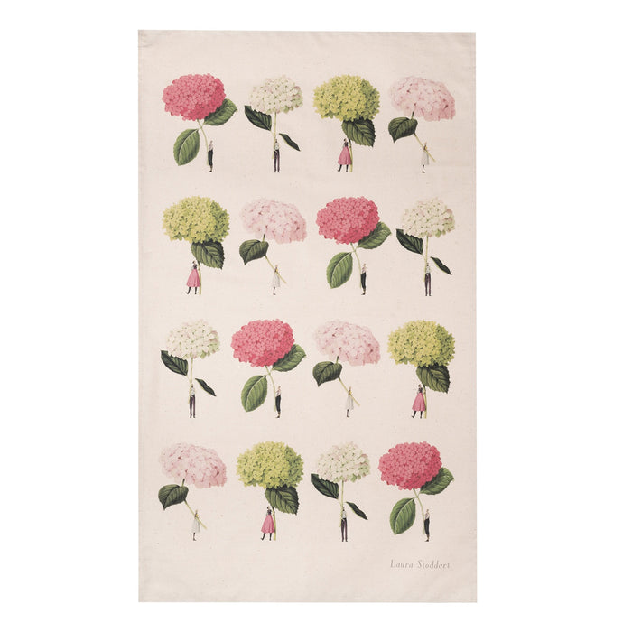 A natural linen tea towel featuring a grid of 16 illustrations of small people holding gigantic hydrangea blooms by the stems, in pink, white and green.
