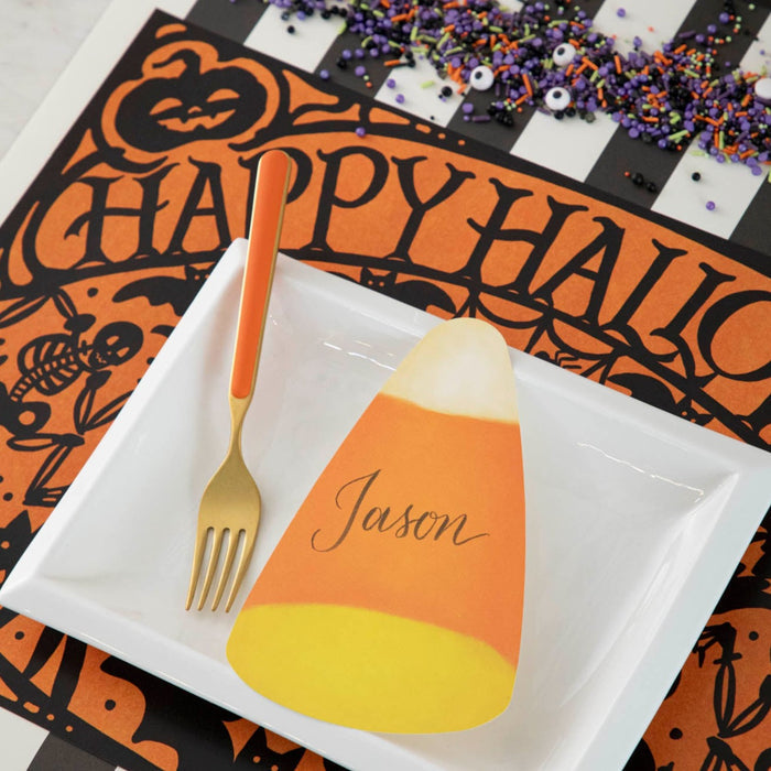 Wicked Halloween Placemat table set up with dinnerware and  halloween themed sprinkles